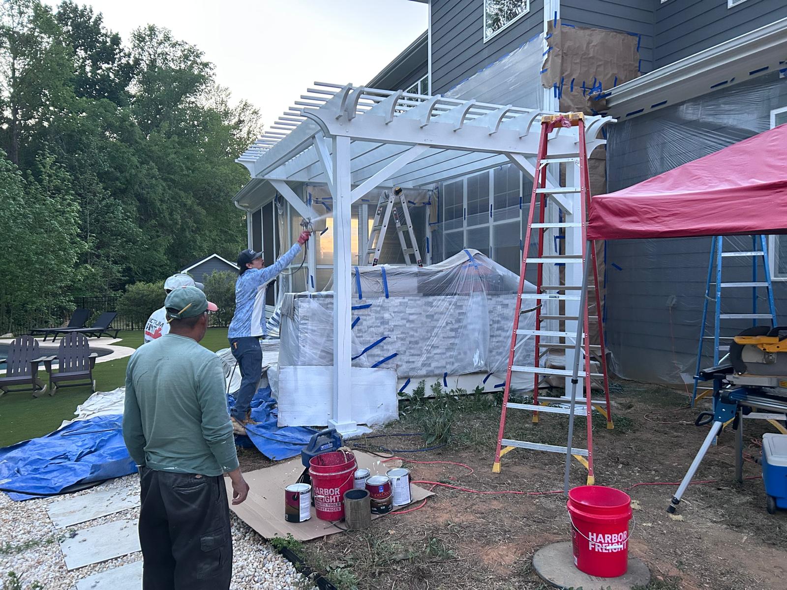 Apex Craft Co craftsman installing fine wood trim in a Raleigh home